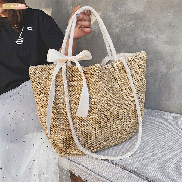 

womens fashionable shoulder bag new ribbon bowknot straw woven rattan bag ladies traveling fashion soild color beach handbag sale