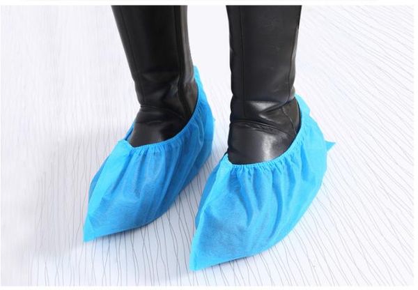 

100pcs/bag non-woven disposable shoe covers resists water dirt and mud protective shoe covers carpet and floors fyc 001