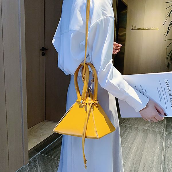 

female diagonal shoulder bag drawstring solid color leather shoulder handbags earphone crossbody bags for women yellow bolsas