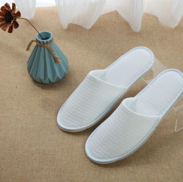 

китай поставщик отель одноразовая удобство белый хлопок вафельные тапочка близко схождение комфортабельный отель тапочка