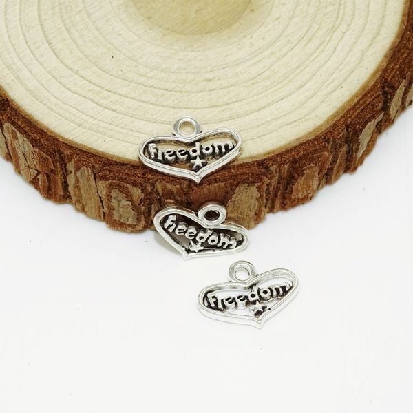 

yamily 30pcs/ 18x13x2mm om hollow out love charms antique silver tone give for lover charms pendant diy jewelry making, Bronze;silver