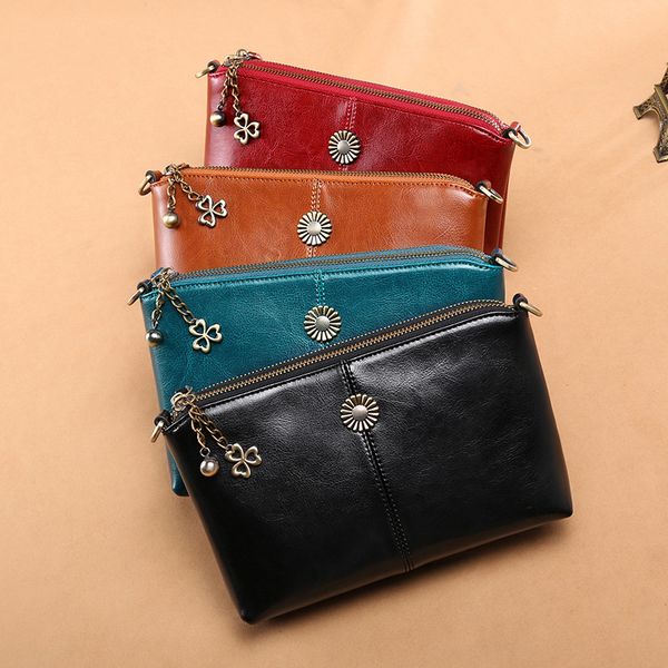 

manufacturers spot wholesale genuine leather handbags leather clutch bag messenger small shoulder bag mini packet korean