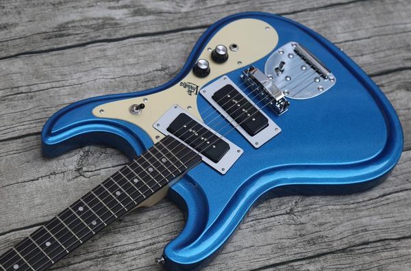 

1966 ventures johnny ramone metallic blue electric guitar bigs tremolo bridge, black p90 pickups, cream pickguard, vintage tuners