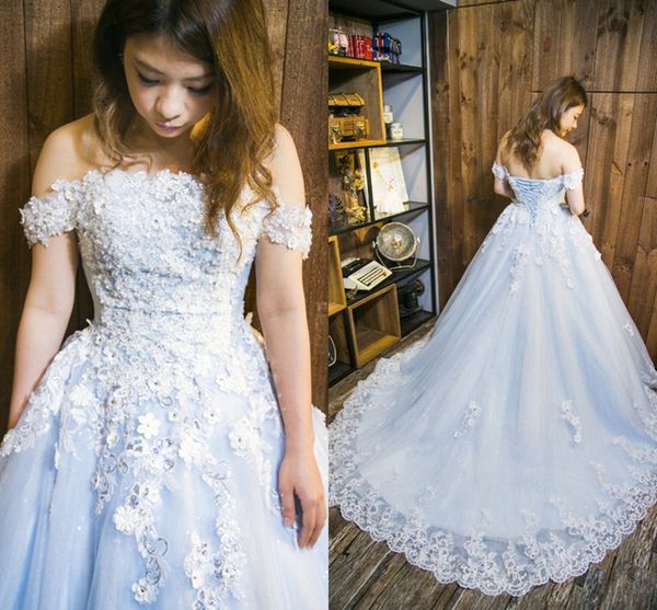 Abiti da sera in pizzo con fiori in pizzo nero Abiti da sera lunghi in tulle blu ghiaccio con perline di cristallo