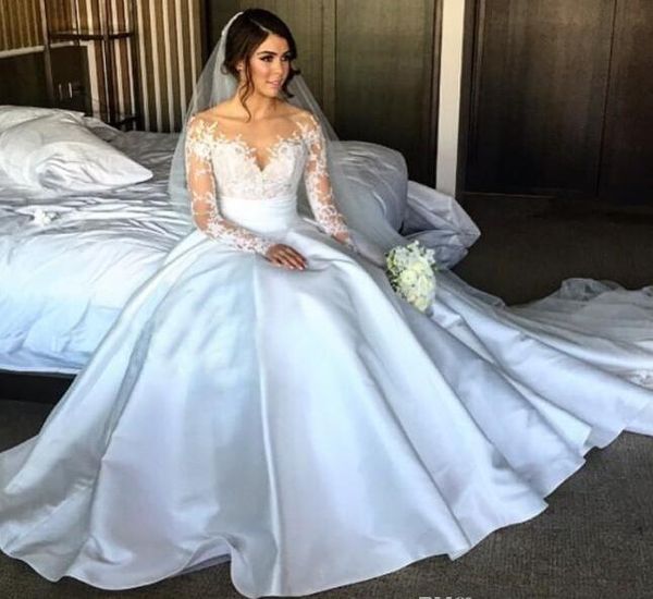 

2019 gorgeous wedding dresses split lace with detachable skirt long sleeves overskirts long steven khalil bridal gowns see through cheap, White