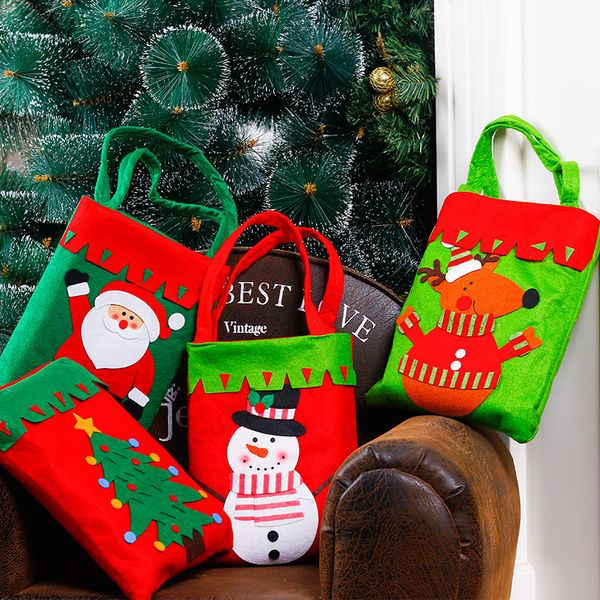 

4pcs christmas decorations non-woven small handbag christmas decorations holiday gifts santa claus gift bag