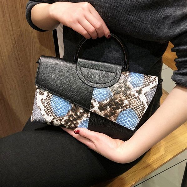 

xmessun 2020 new folding envelope bag female python clutch bag fashion trend snake pattern hand wild party shoulder f390