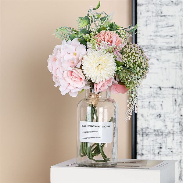 

рука держит большой искусственный цветок завод бонсай свадебные украшения инс ветер