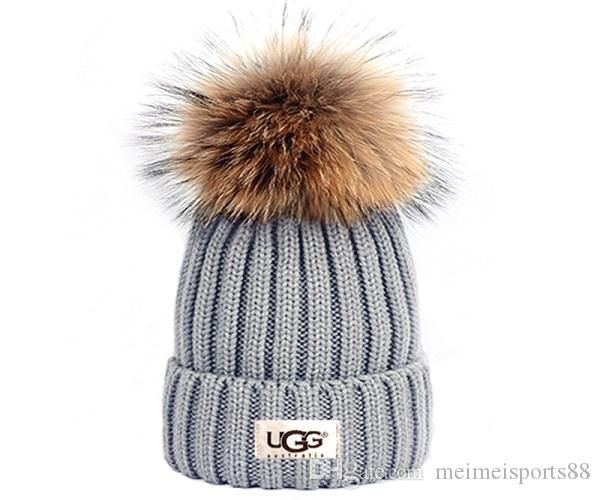 

роскошные женщины зима бренда мужчины beanie модельеры bonnet женщин вскользь вязание хип-хоп gorros помпонами черепа шапки шляпы на открыто