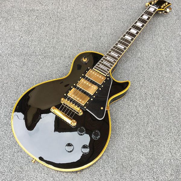 

Высококачественная 6-струнная электрогитара, черная яркой краска с желтой обертк