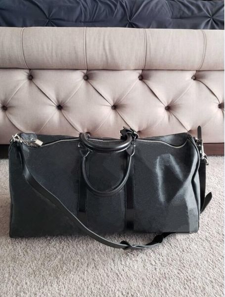 

Men luxury de igner travel luggage bag men tote keepall leather handbag duffle bag ac 2019 brand fa hion luxury de igner bag