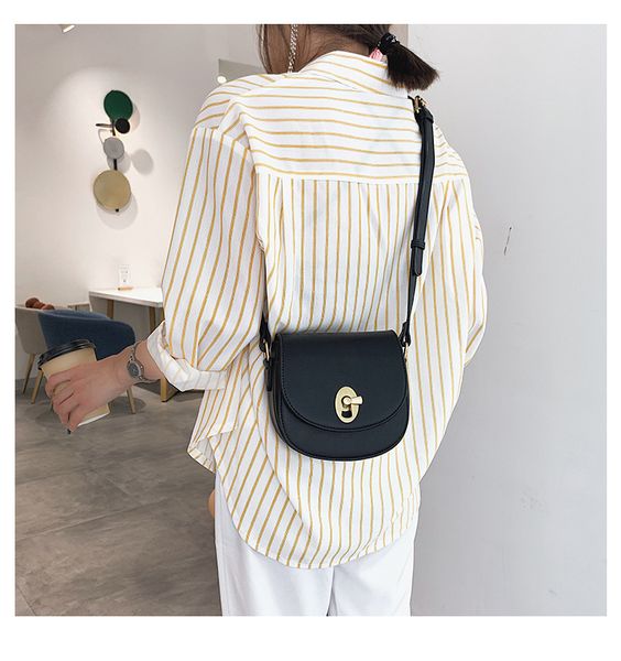 

shangxin women's new summer 2009 chaozhou korean version baita slant bag metal simple fashion single shoulder saddle bag