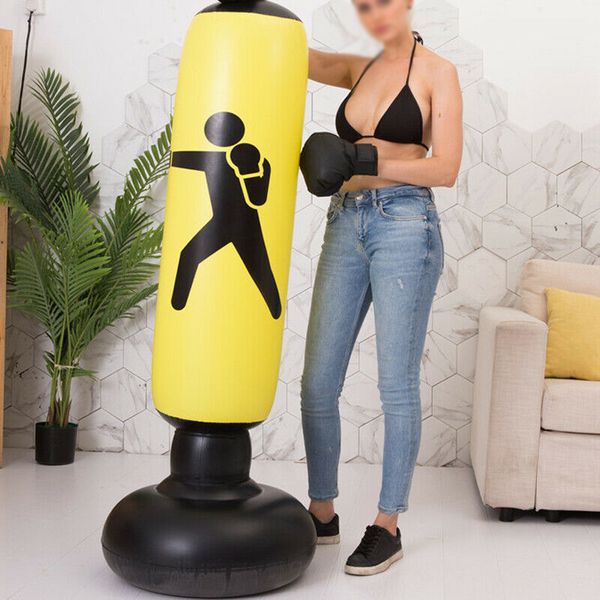 

kids sparring punching bag boxing standing sandbag training workout