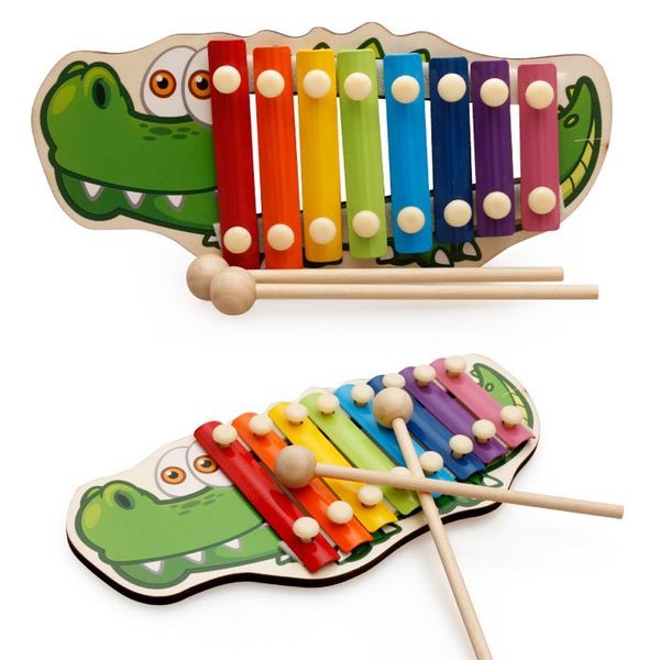 

wooden crocodile playing the xylophone 3 hand playing wooden balls toys