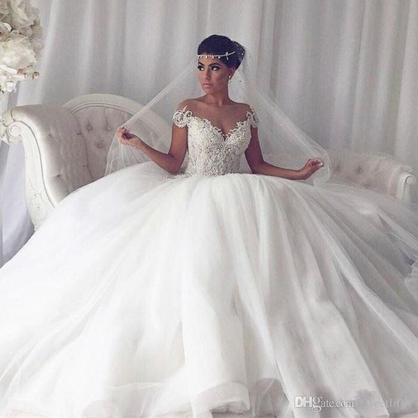 

2020 elegant sheer jewel neck wedding dresses short sleeve puffy tulle a line bridal gown custom made for church style, White