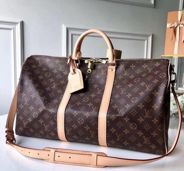 

2019 men duffle bag women travel bag hand luggage luxury de igner travel bag men pu leather handbag large cro body bag tote 55cm