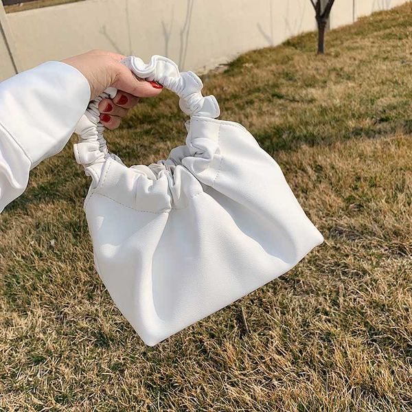 

роскошная кожаная сумочка вечерние клатчи женская рука мягкая кожаная сумка через плечо женская сумка тотализаторы женская маленькая сумочка