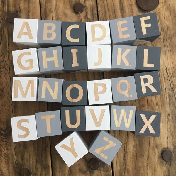 pink wooden alphabet blocks