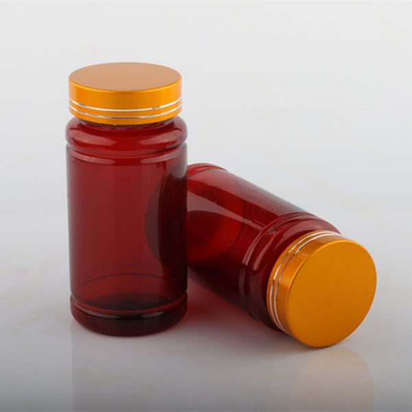 

brown capsule pill bottle, empty plastic pill container with gold silver cap fast shipping f2028