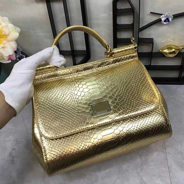 

The new medium PRAD handbag fashion gold Python leather shoulder bag pressure