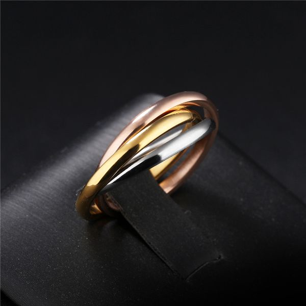 Fashion Classic Creative Trinity Three Ring Winding Ring Fedi nuziali da donna in acciaio inossidabile a 3 colori