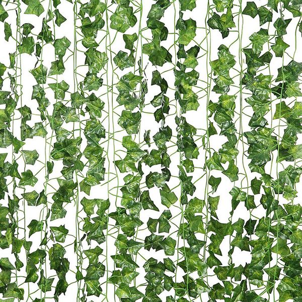 

artificial monstera leaves fake plants hanging ivy vine leaf garland jungle party hawaiian wedding decoration party backdrops