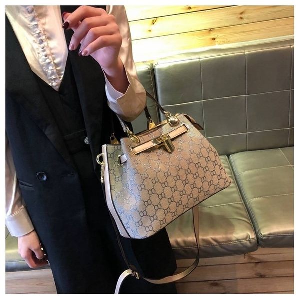 

singapore small ck kylie package 2019 texture hand bill of lading shoulder messenger genuine leather western style woman package luxury bag