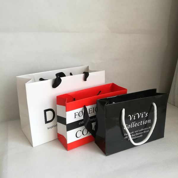 

wholesales 1000pcs/lot custom fashionable paper bags/shopping bags/clothes bags for ads