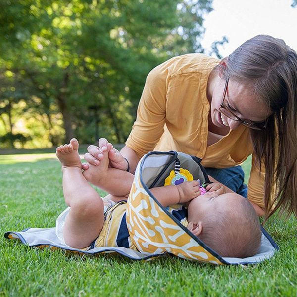 

portable diaper changing pad clutch with barrier foldable clean hands changing station soft flexible travel mat blanket