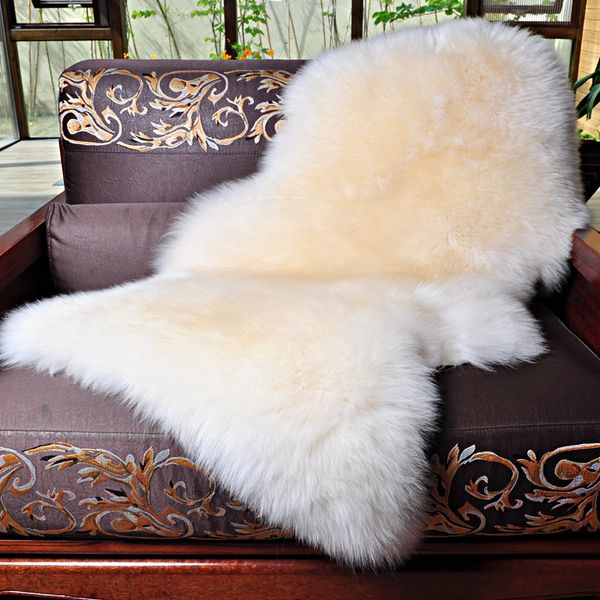 Sheepskin rug on sofa