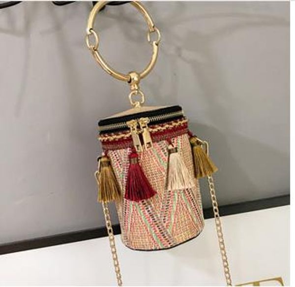 

new chain national wind ring shoulder bag straw woven cylinder small bag small fairy tassel bucket bag