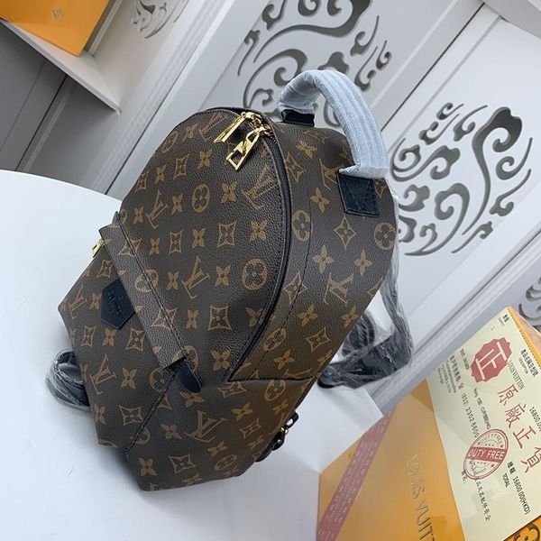 

роскошная женщины mens zipper backpacks новый 2020 высокое качество ручка тотализаторов простой стиль мужчины кожаный рюкзак леди плечо сумк