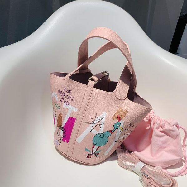 

pink bucket bag ladies fashion designer graffiti vegetable basket mother bag youth personality trend wild diagonal female bag 665