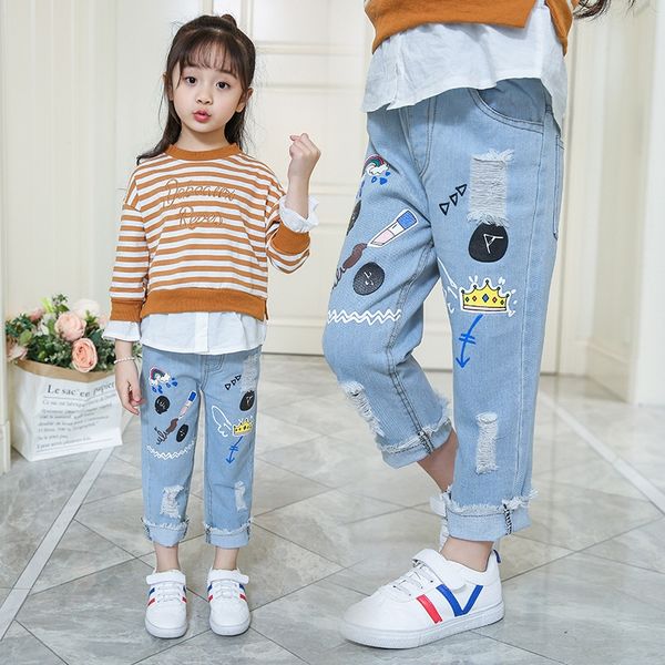 

2019 clothing autumn new girls' korean and children's wear cartoon printed jeans medium and large children's light hole jeans, Blue