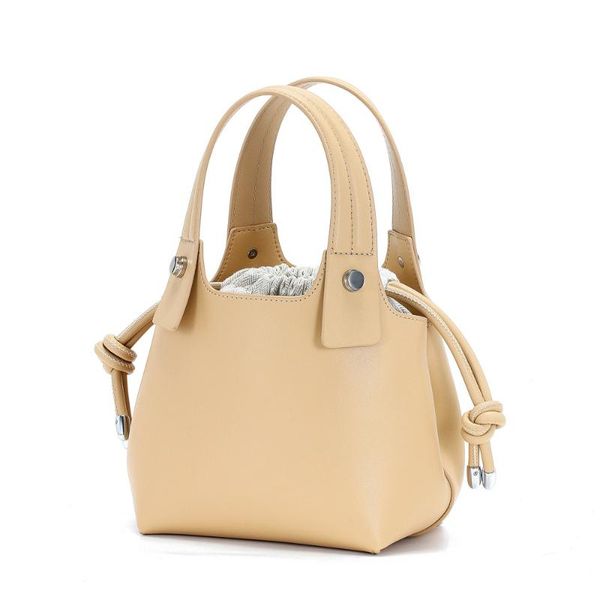 

female genuine leather 2020 new design solid color drawstring bags simple wild shoulder messenger portable bucket bag