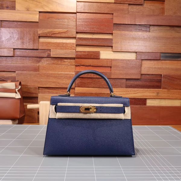 

whosale handmade epsom leather dark blue design mini bag,19cm wax thread, have both gold and silver hardware,contact me for details
