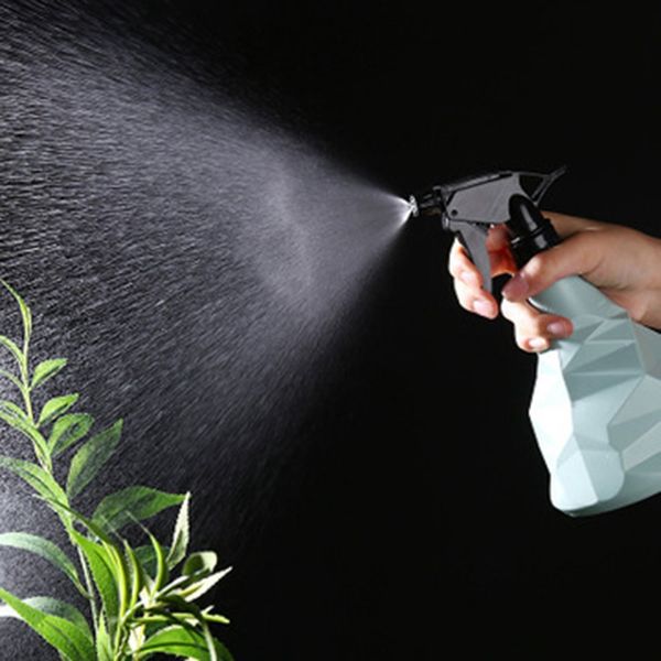 

hand pinch small watering can watering can small spray bottle gardening household