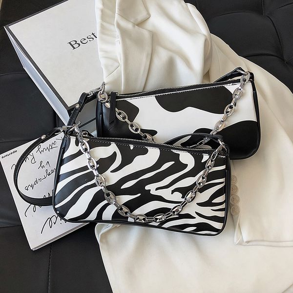 

cow pattern small pu leather armpit bags for women 2020 fashion animal pattern shoulder handbags female chain bag