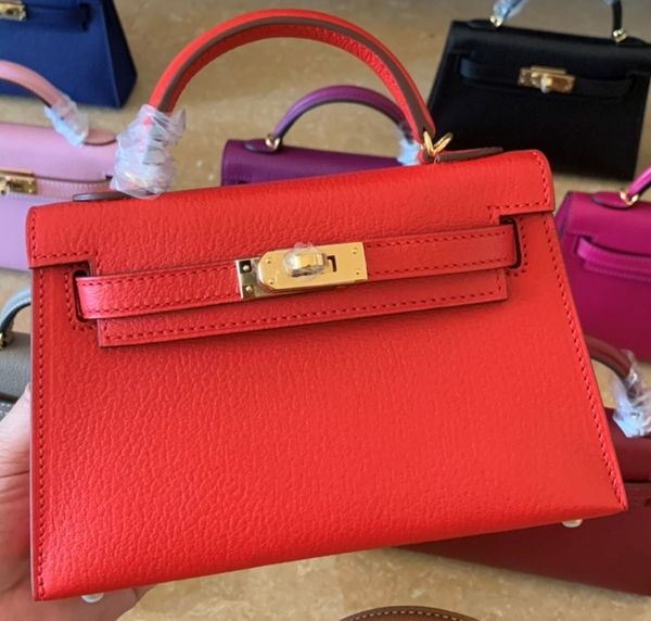 

whosale handmade lamb skin red design mini purse,19.5cm wax thread, have both gold and silver hardware,contact me for details