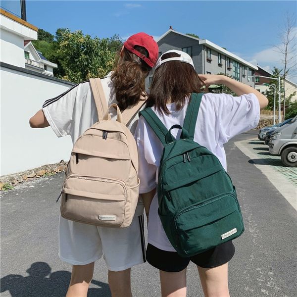 

double shoulder female pure color simplestudent waterproof large capacity travel backpack male leisure couple backpack