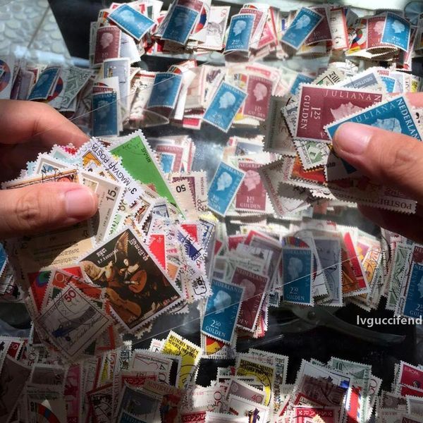 

wholesale-100 pcs/lot no repeat postage stamps collections from many country with postmark stamp postal all used, collection gift