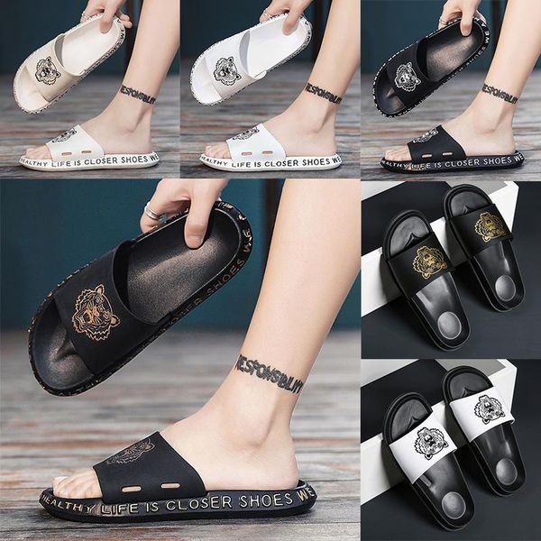 

kanye west slippers black white resin desert sand designer slippers summer fashion tiger head flat slide men beach causal sandals