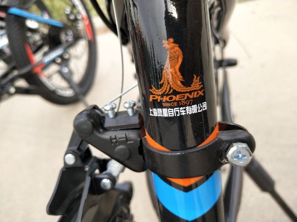 

authentic phoenix childrens mountain bike 20/22 inch men and women students variable speed bike cross-country shock absorption bike