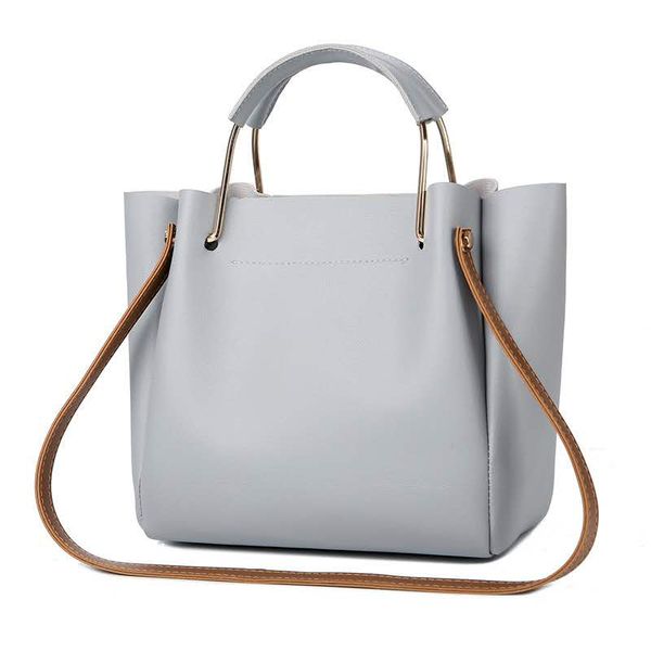

a summer 2020 new korean version of the package solid color ladies handbag metal handle casual shoulder bag