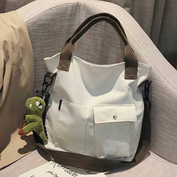 

women's large capacity black canvas bag new white 2020 ins korean student portable tote bag shoulder messenger