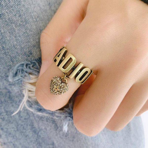 

c1934 europe and the united states restore ancient ways wind brass new style jewelry senior letters heart hollow finger ring size 6 7 8, Silver