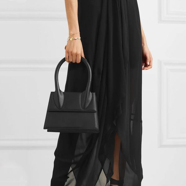 

women selling minimalism style genuine skin clean and chic designer handbag street look kelly flap bag