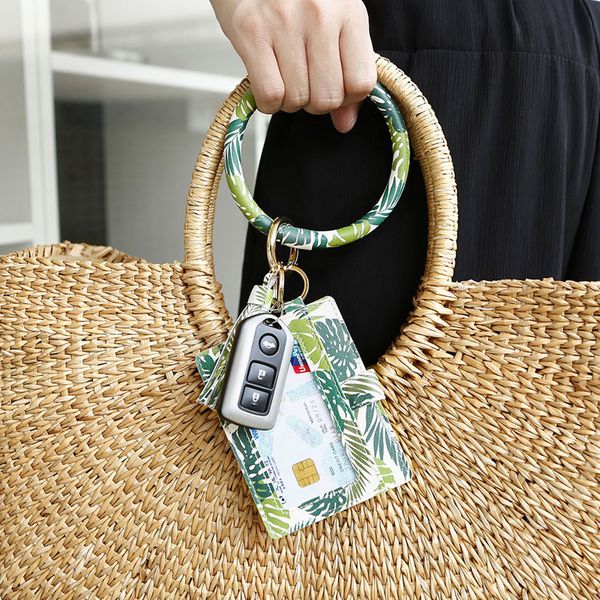 

pu leather tassel keychain bracelet for women wallet round keyring clutch bag wallets fashion card package 4 styles l196fa