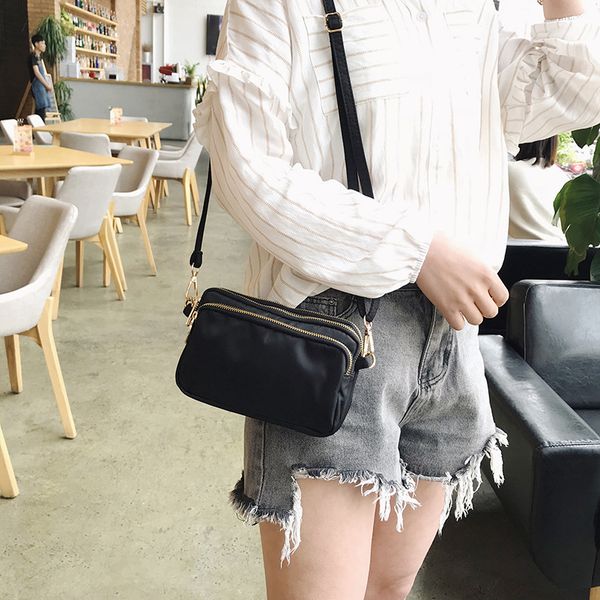 

2020 fashion ms. shoulder bag new women's bag messenger small multi-layer practical leisure change mobile phone