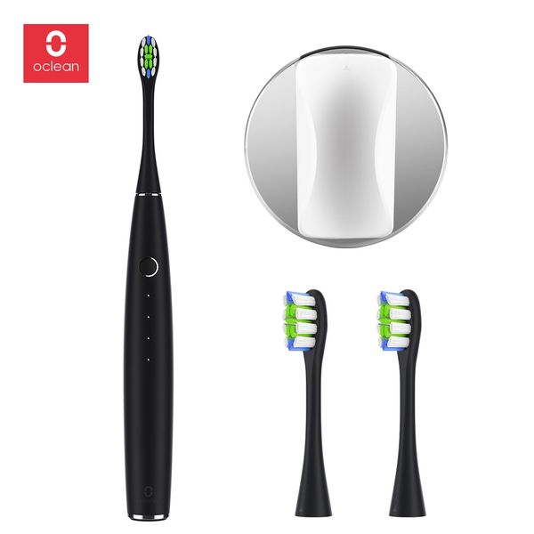 

oclean one electric toothbrush set with 2 brush heads and 1 wall-mounted holder